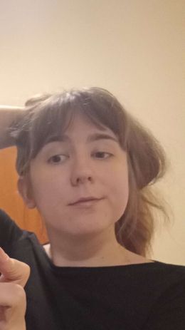 selfie where i'm holding my hair back and making the Dreamworks face