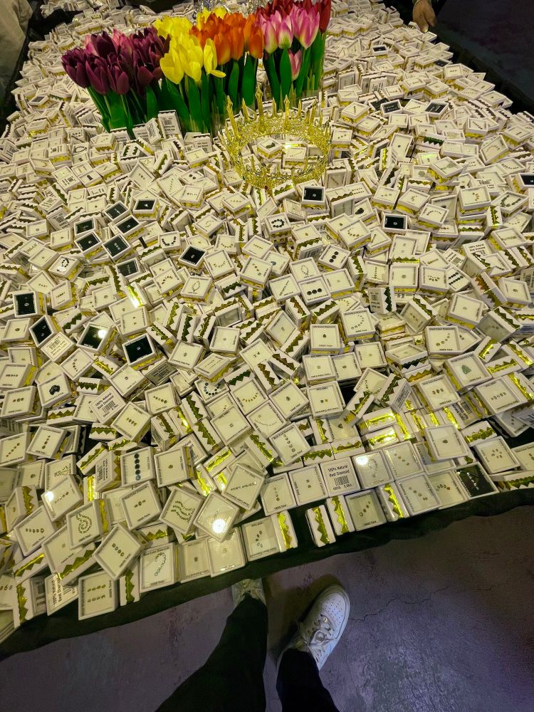 a table at the gem show stacked with a nice variety of diamonds 