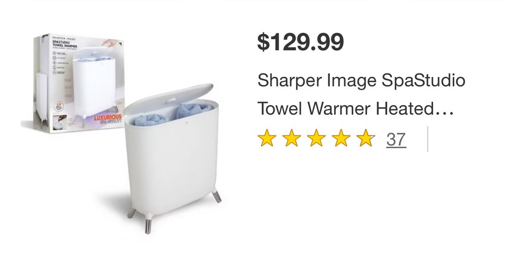 Phot has f sharper image towel warming device 