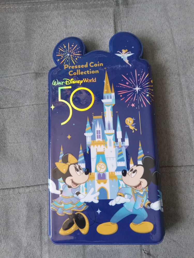Disney pressed coin booklet 
50th Anniversary Edition