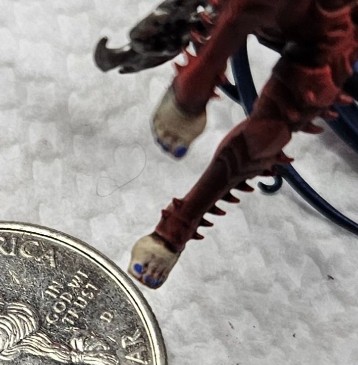 Lelith Hesperax of the Drukhari, her painted toenails.