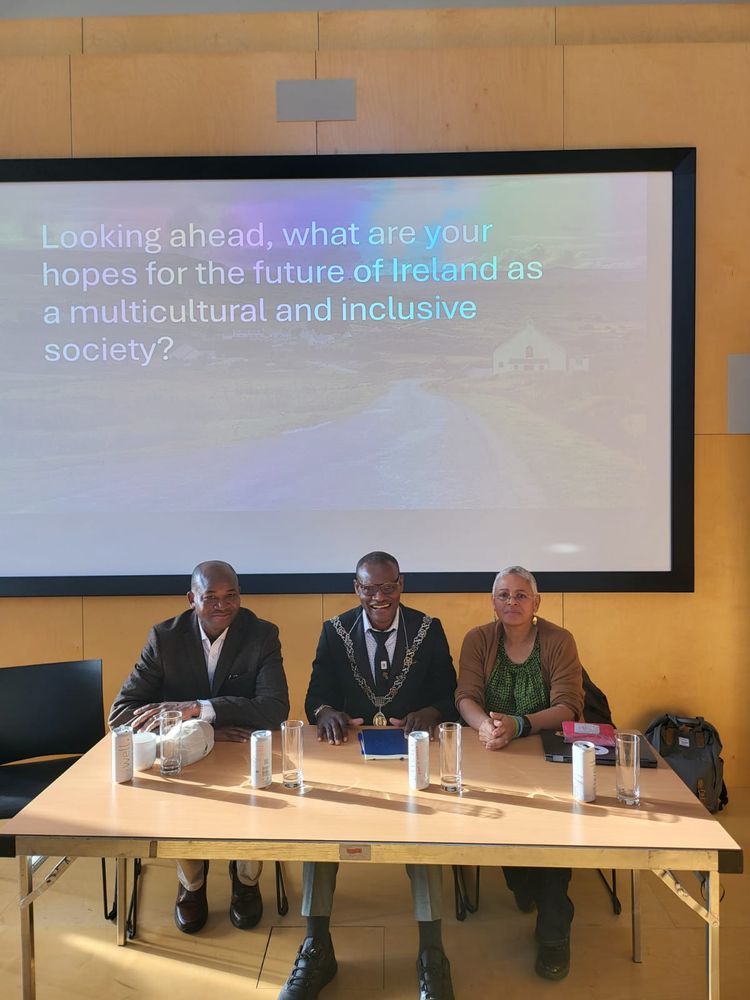 Photo of Cllr Kamegni, Femi Amao, and Philomena Mullen at UCC today. 