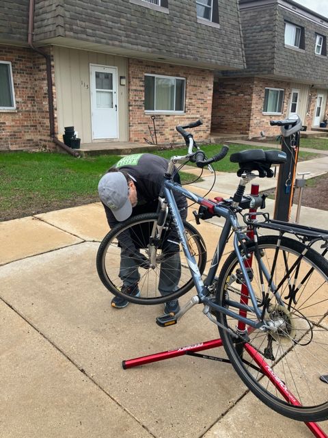 Volunteers do free bike repairs.