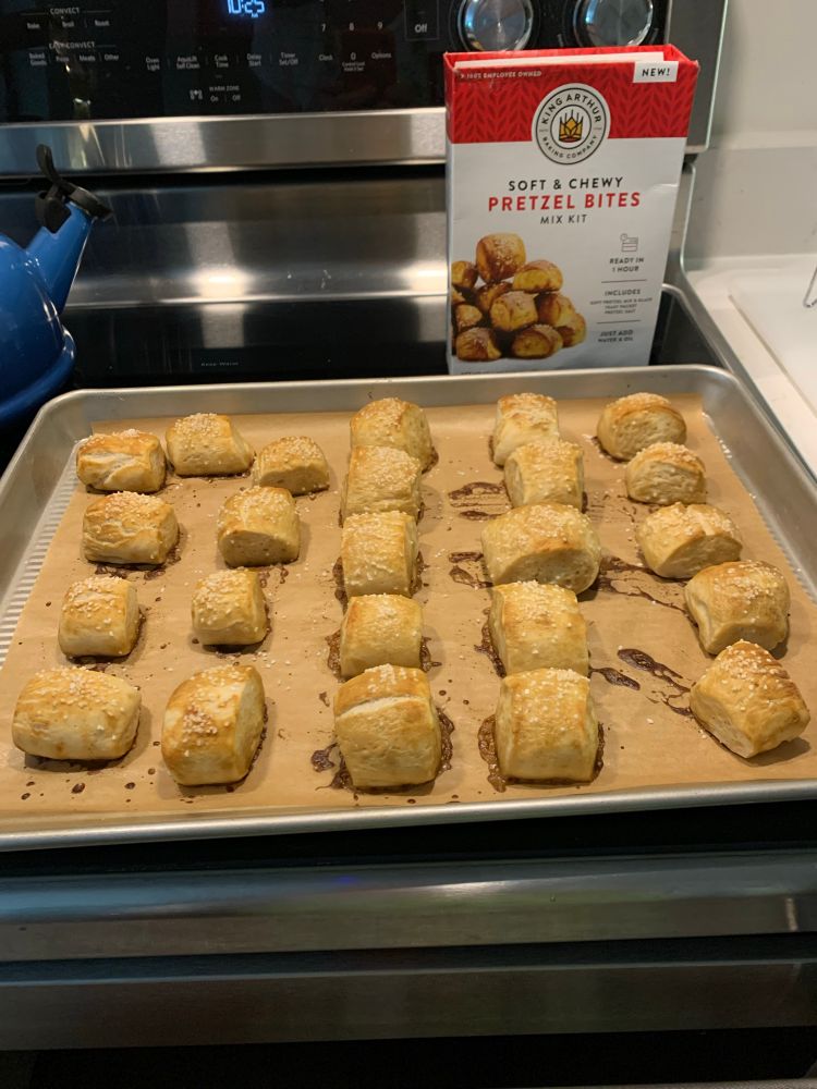 A baking tray of mini pretzels and the box mix from King Arthur 