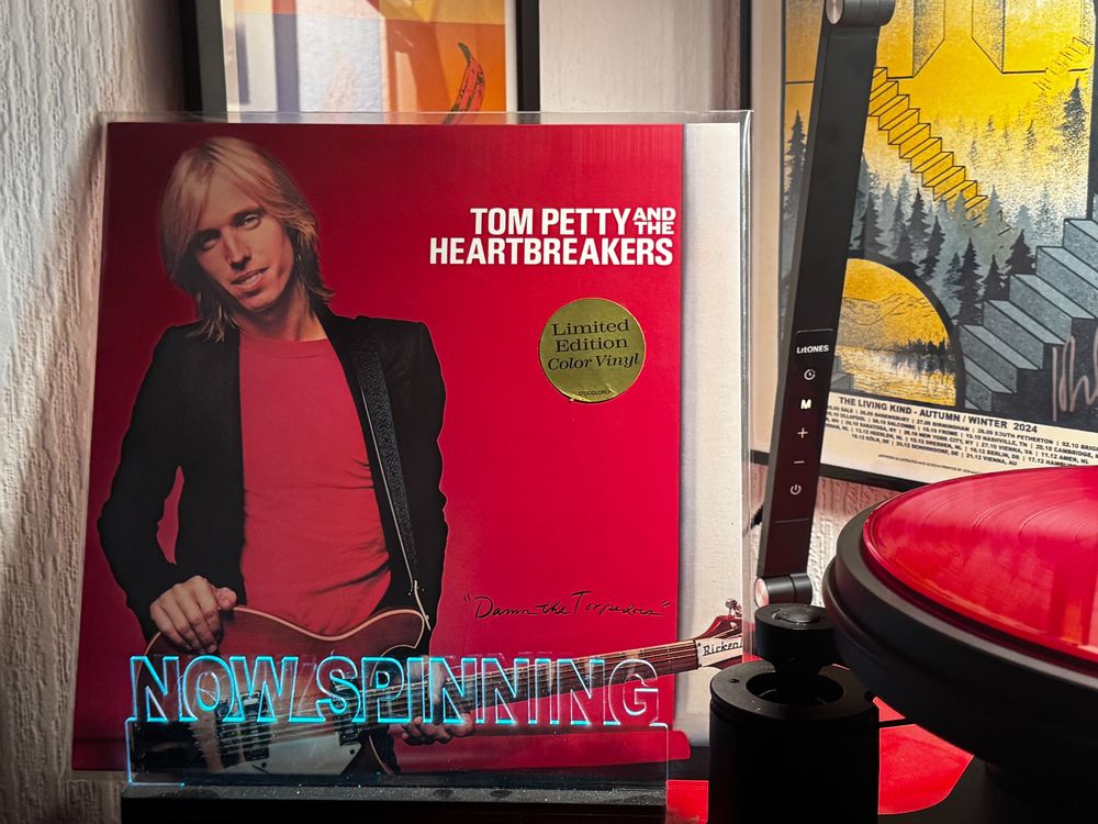Spinning Tom Petty and The Heartbreakers: Damn The Torpedoes on vinyl. 