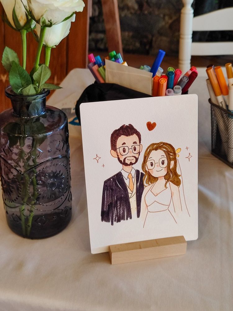 pic of a small portrait drawing of a bride and groom