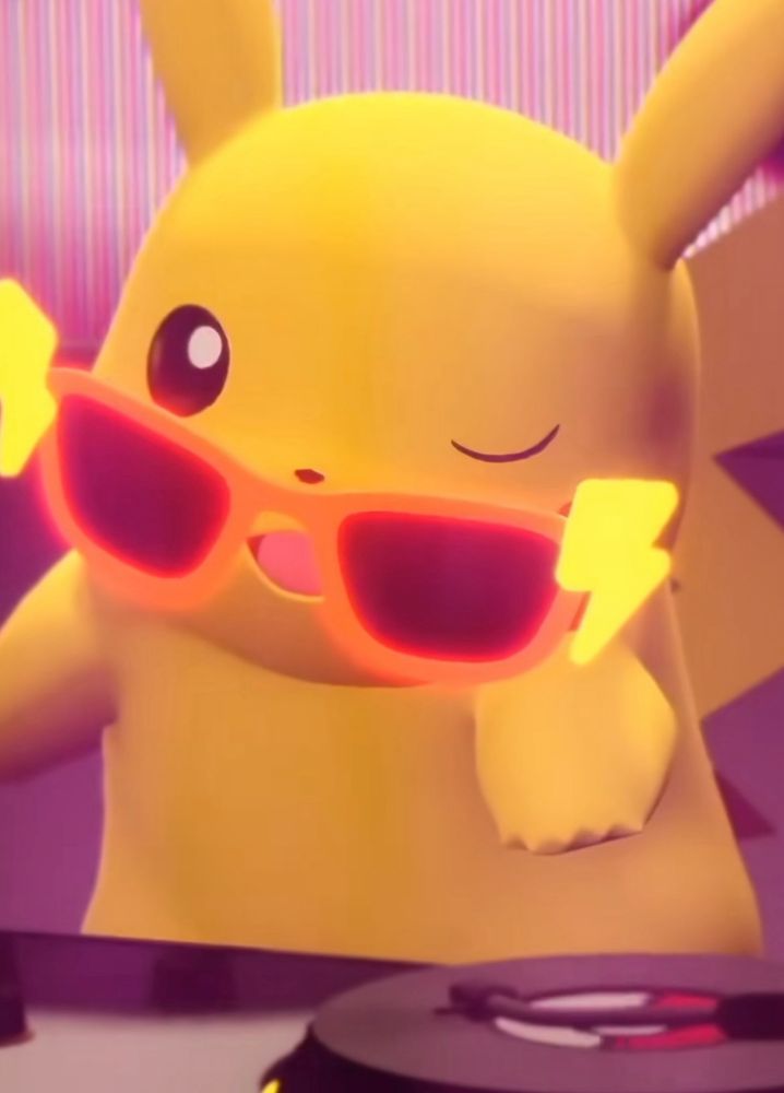 It’s an image of a Pikachu behind a DJ booth. It is wearing sunglasses low on its face and you can see it blink. 