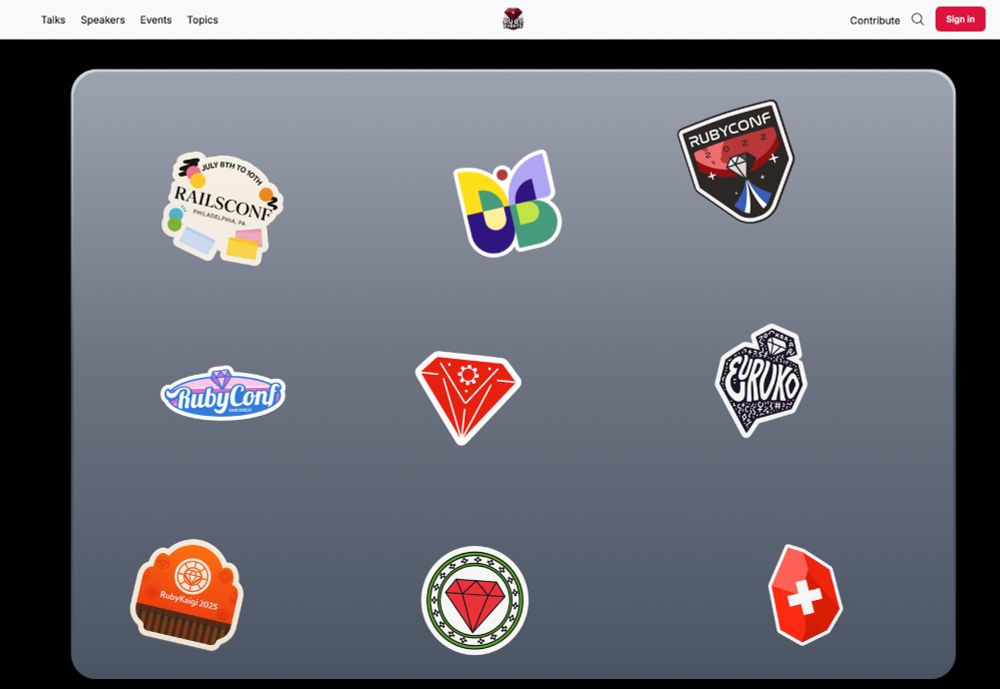 A laptop covered with Ruby event stickers on RubyEvents.org.