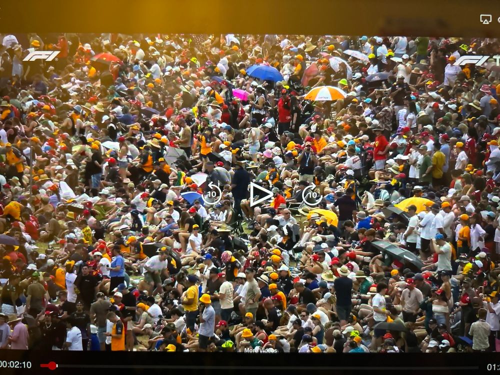 A huge jumble of people getting ready to watch F1