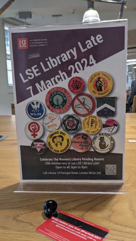 A sign on a desk advertising LSE Library Late on 7 March 2024, 6pm to 9pm.