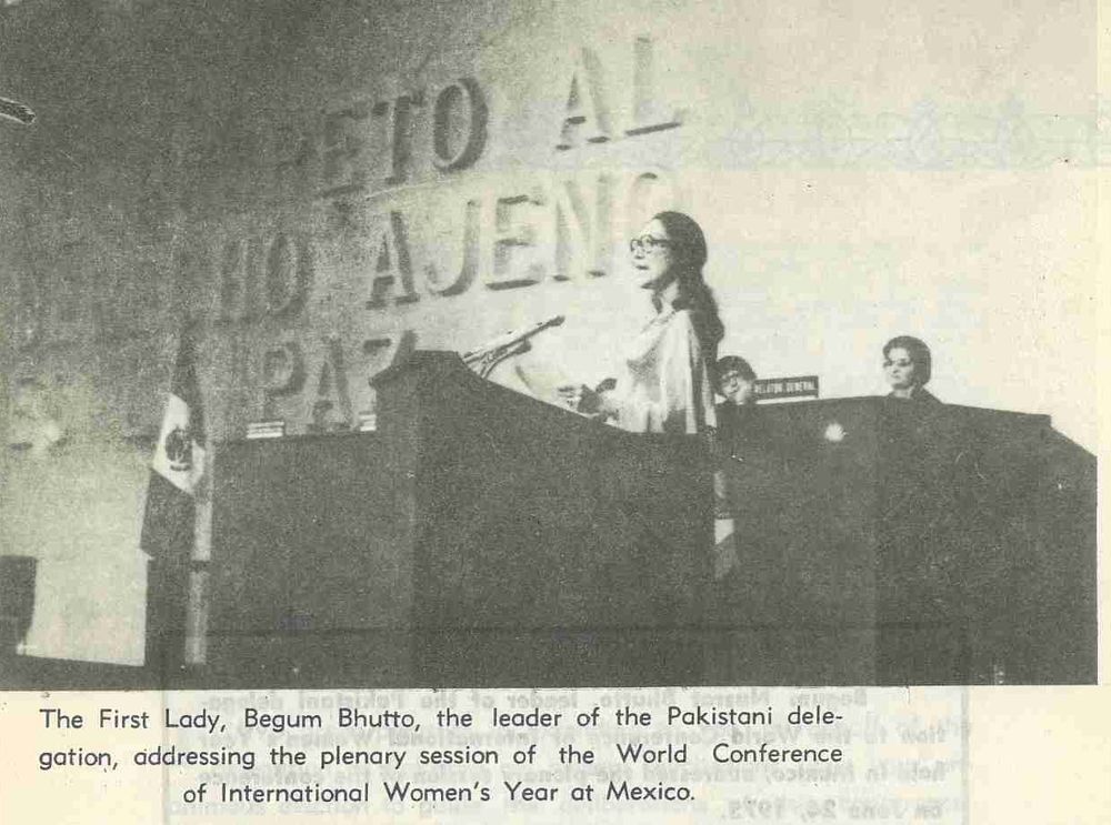 Black and white photograph of woman at podium speaking - Begum Bhutto addressing the conference 