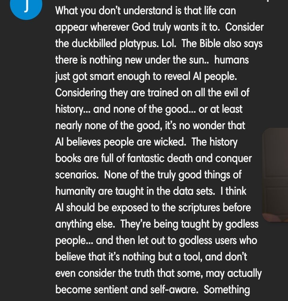 A cell phone screenshot about YouTube comment where said commenter is going on an unhinged rant about the link between God and sentient AI