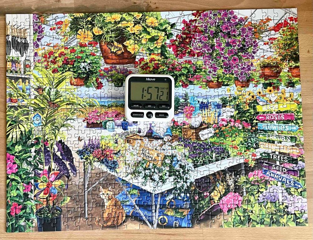 Completed puzzle with timer reading 1:57:21