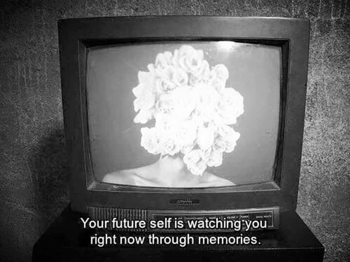 Old B&W TV showing image of person with a flower for a head, captioned "Your future self is watching you right now through memories."