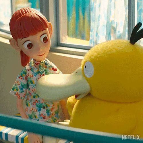 a yellow stuffed animal is sitting next to a girl with red hair and a netflix logo on the bottom