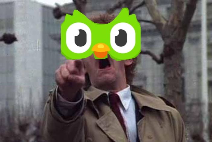Pointing Donald Sutherland with Duo from duolingo overlain really badly.