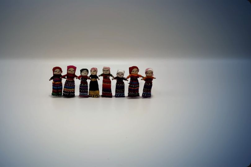 a line of 8 worry dolls