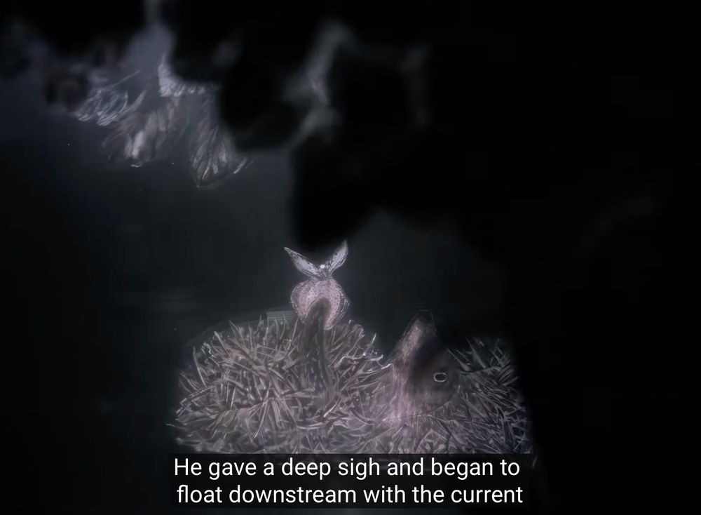 A still from the stop-motion short, Hedgehog in the Fog, showing a glassy-eyed hedgehog floating down a river on his back with the caption, "He gave a deep sign and began to float downstream with the current"