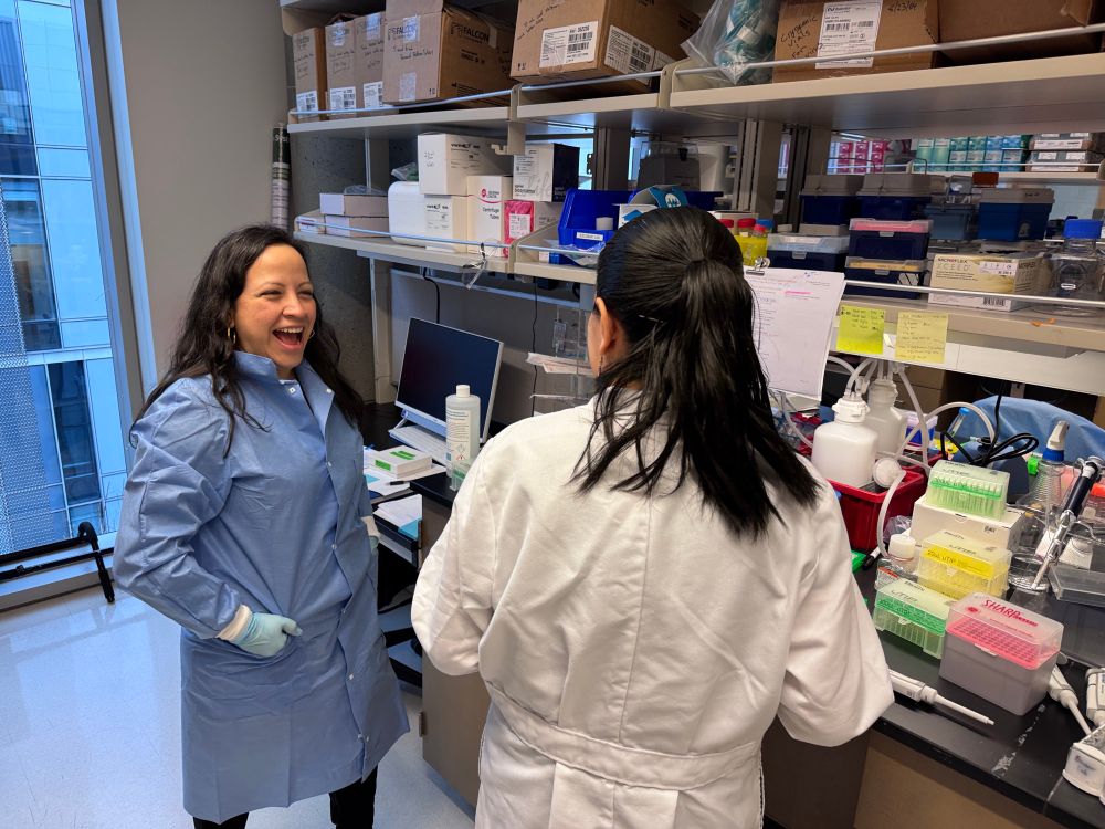 Two women scientist talking in the lab