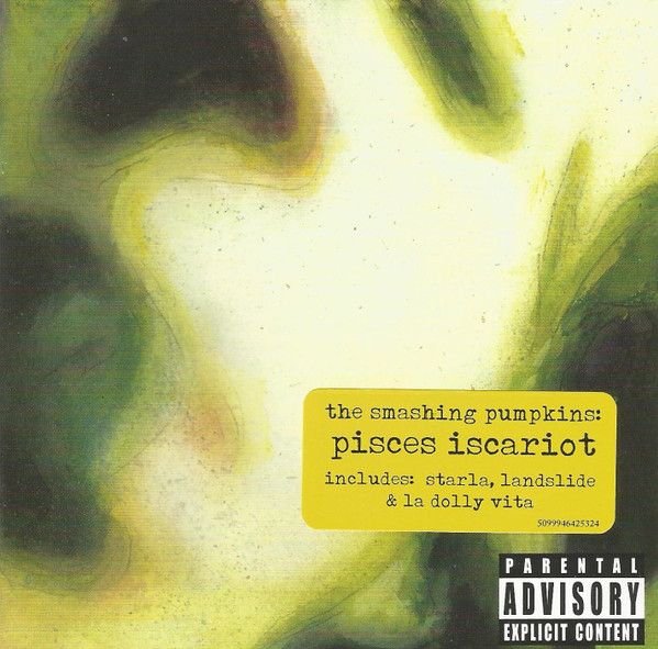 cover art for pisces iscariot. A green and yellow abstract design. Text on cover reads: "the smashing pumpkins. pisces iscariot. includes starla, landslide and la dolly vita. Parental Advisorty, explicit content"