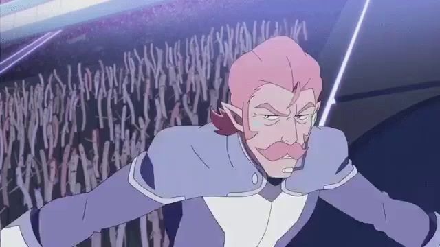 a cartoon man with pink hair and a mustache is standing in front of a crowd .