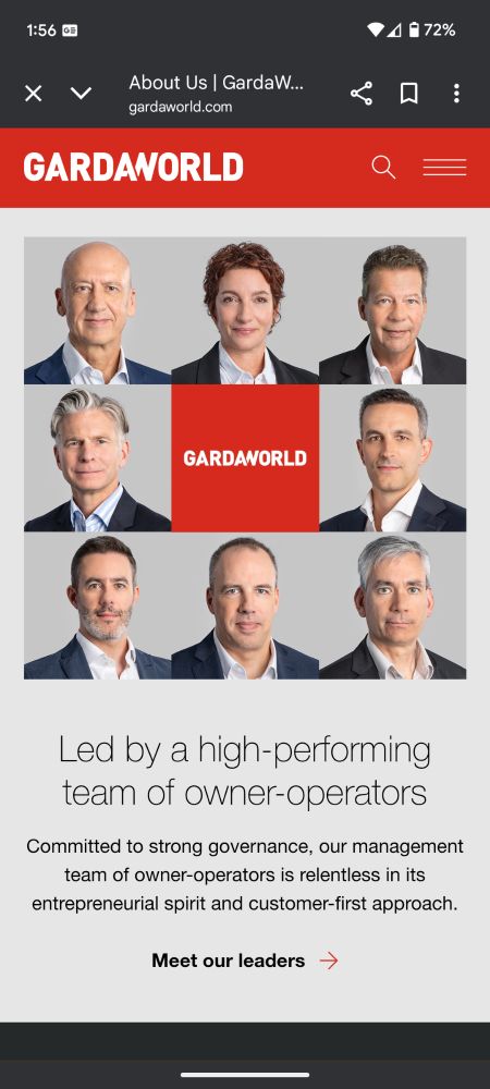 7 white men and 1 white woman in black suits