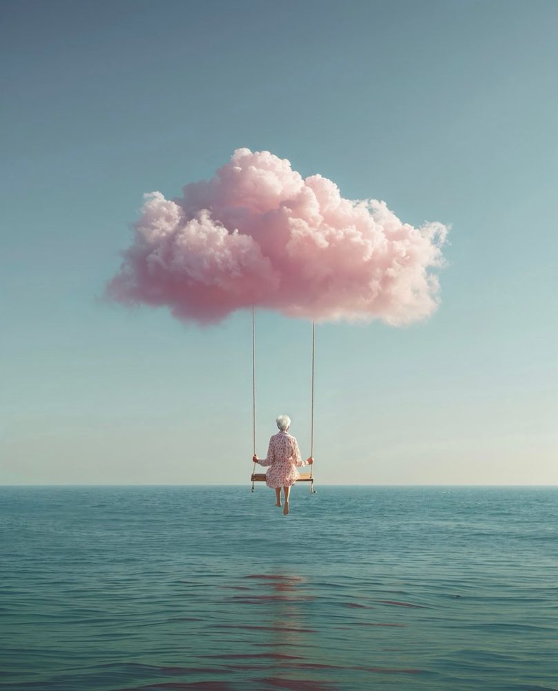 Bild von Jonas Peterson

Bildbeschreibung (Deutsch):
Das Bild zeigt eine surreal wirkende Szene: Eine Person sitzt auf einer Schaukel, die scheinbar an einer großen, rosafarbenen Wolke befestigt ist. Die Schaukel hängt hoch über einem ruhigen, endlosen Meer. Die Person trägt ein helles, gemustertes Kleid und sitzt barfuß auf dem Holzsitz, mit dem Rücken zur Betrachtenden. Der Himmel ist klar und weichblau, was der gesamten Szene eine ruhige, träumerische Atmosphäre verleiht. Die rosa Wolke wirkt beinahe wie Zuckerwatte und verstärkt den fantasievollen Charakter des Bildes.

Image Description (English):
The image depicts a surreal scene: A person sits on a swing that appears to be suspended from a large, pink cloud. The swing hangs high above a calm, endless ocean. The person is wearing a light, patterned dress and is barefoot, seen from behind as they sit on the wooden swing seat. The sky is clear and soft blue, giving the entire scene a peaceful, dreamlike atmosphere. The pink cloud resembles cotton candy, adding to the whimsical and imaginative feel of the image.