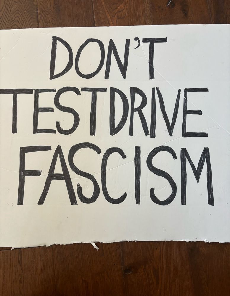 Homemade sign that reads Don’t Testdrive Fascism