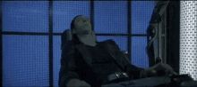 JT from Grandmas Boy in a fully immersive monitor setup with reclining chair. 