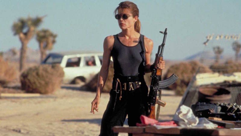 Sarah Connor in Terminator 2. She is totally shredded, toting a massive gun, and ready for war against the machines. 