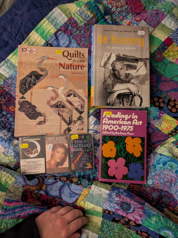 Three books and three cassette tapes, book 1. quilts from nature by Joan colvin. Book 2. Mark Stevens and Annalyn Swan, de Kooning An American Master. book 3. readings in American art 1900 to 1975 edited by Barbara Rose. Cassette tapes is four season of of love by Donna Summer Dionne Warwick greatest Hits 1979 to 1990, space taculars John Williams, the Boston pops. Star wars, The empire strikes back, return of the Jedi, Star Trek, ET and more.