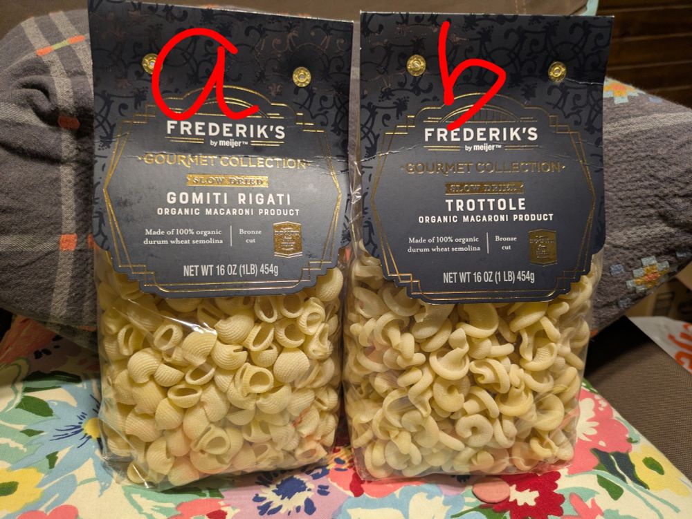 Two bags of pasta, bag A is Gomiti Rigati like tiny fat elbow pasta with no arms, just the joint.  Bag B is a Trottole, it's spiral like but more how an ear is spiral than an actual spiral spring.