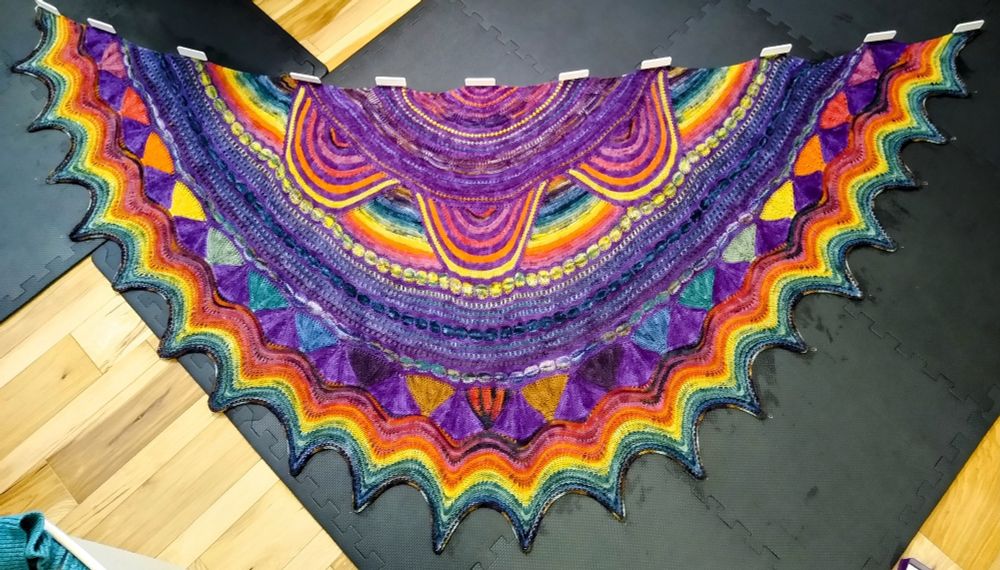 This year's Westknits mystery knit along: the gogodynamo with purple base and rainbow mini skeins 