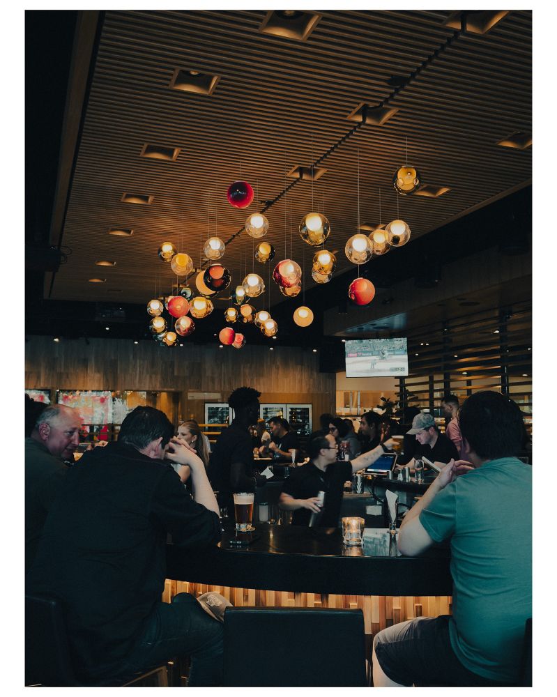 Bar with cool lights above it