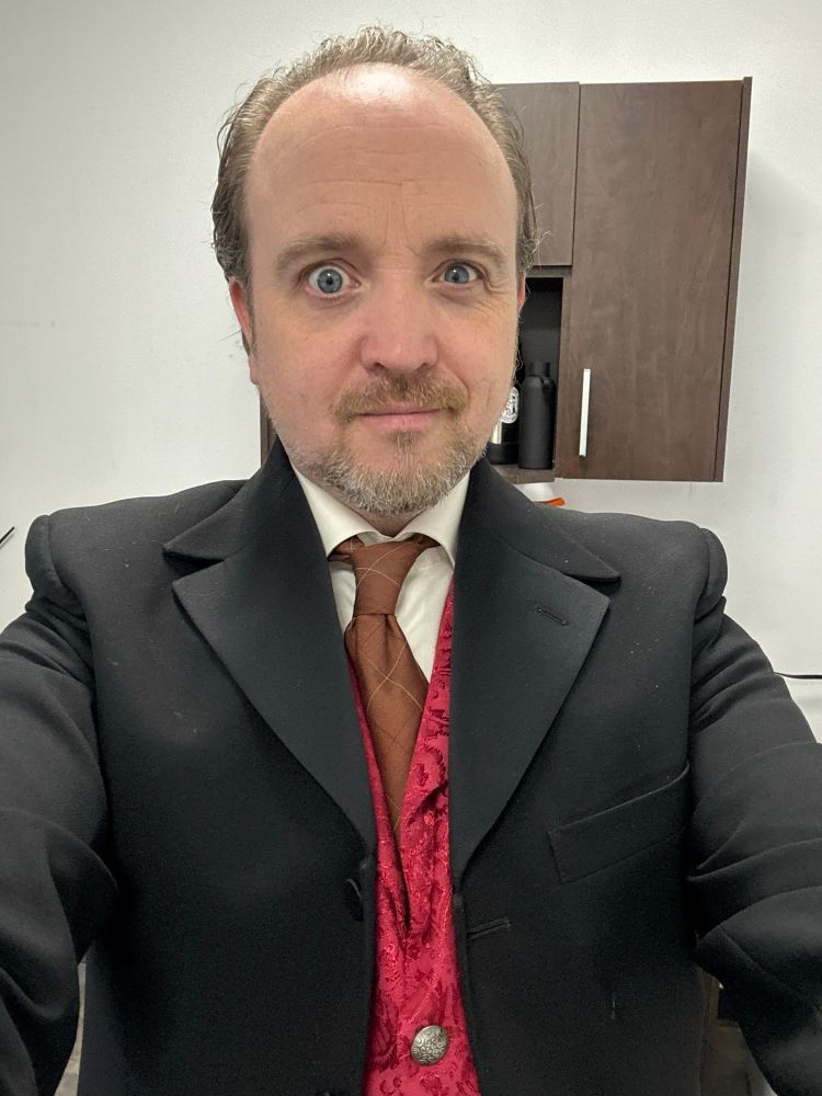 Me as my mentalist, Daniel Irving, diving into a full night of spooky possessions at The Séance Experience