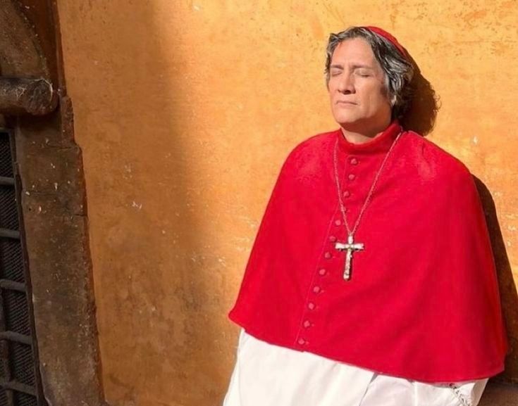 Cardinal Benítez from the movie Conclave (2024) illuminated by the sun.