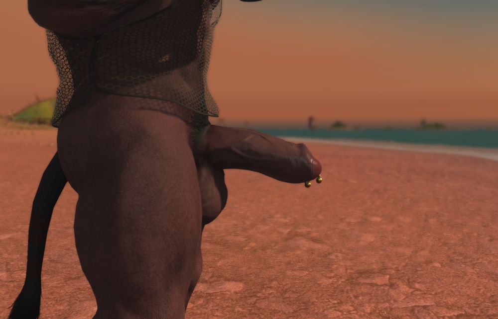 A close up profile view of his cock.