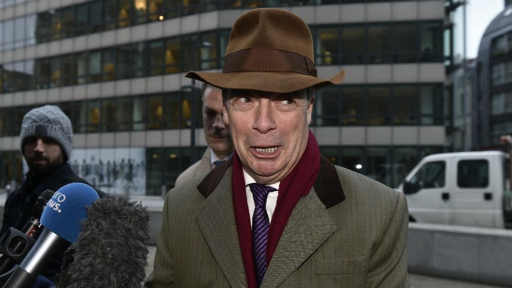 Nigel Farage allegedly held several secret meetings with Julian Assange and gave him a USB stick with data on it, a US congressional enquiry has heard.