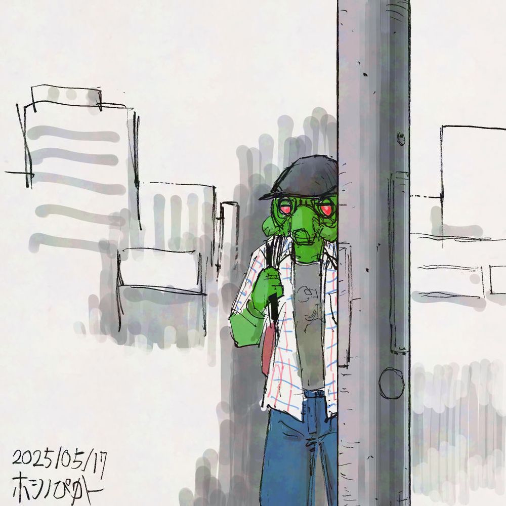電柱に隠れている緑色のサイボーグらしき人。