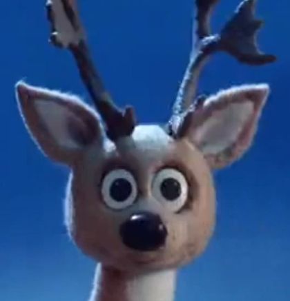 A reindeer from the film "A Year Without A Santa Claus" staring at the viewer