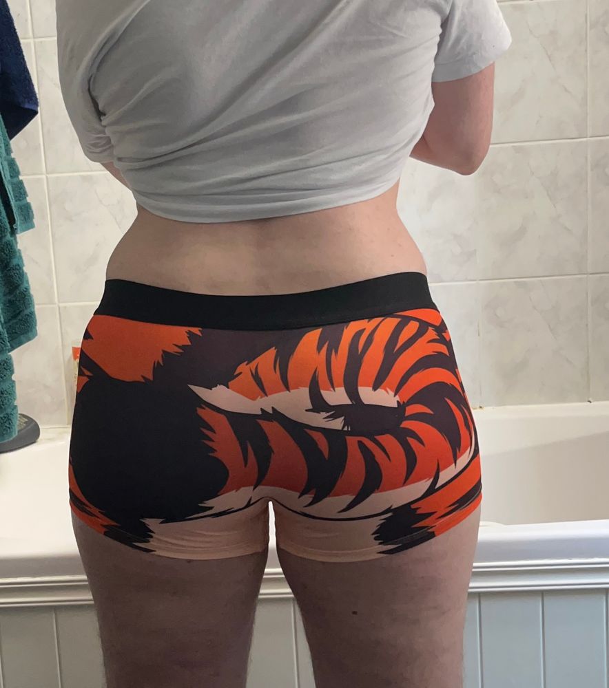 cute cat butt (me standing in a bathroom wearing tiger-print boxers)