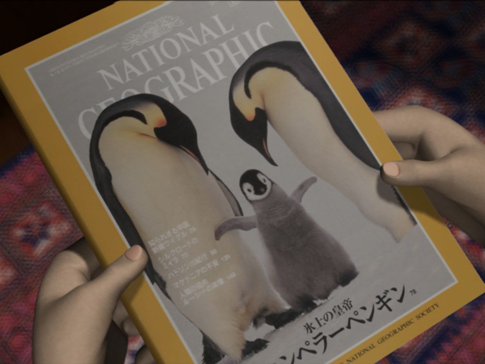 a closeup of a national geographic book about penguins found in simon's room