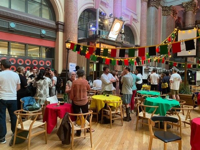 Photo of writers mingling at our Manchester summer meet-up
