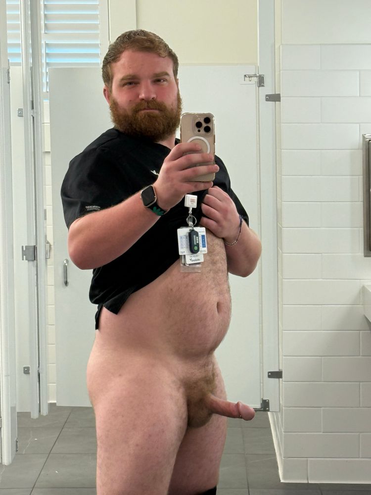 Me standing with an erection in a public restroom with my pants down 