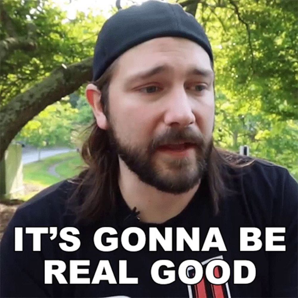 a man with long hair and a beard says it 's gonna be real good while wearing a black hat