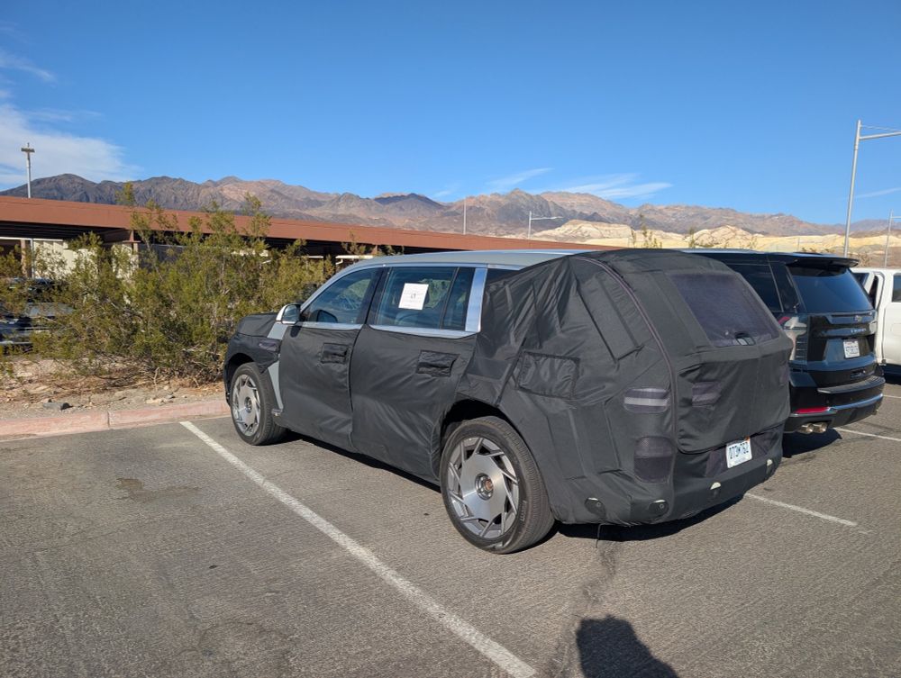 Hyundai test car covered in tarpaulin, equipped with C4 salad shooters
