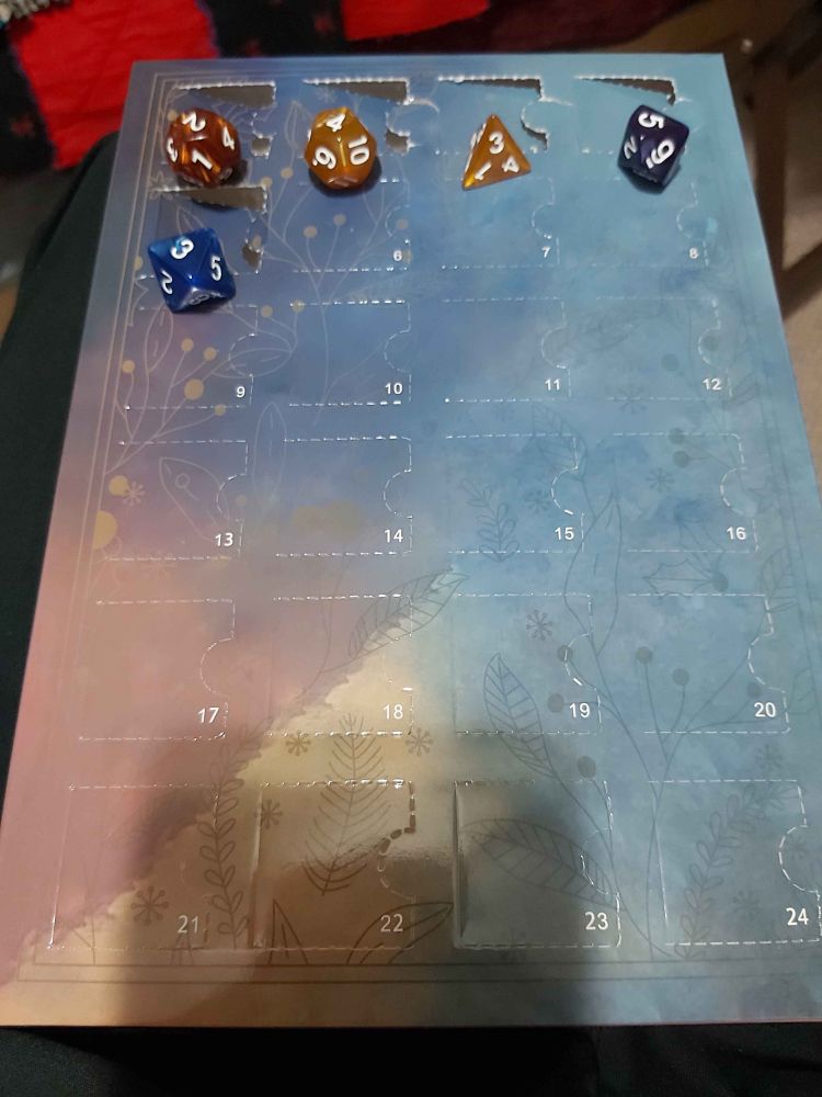 An advent calendar with dice inside