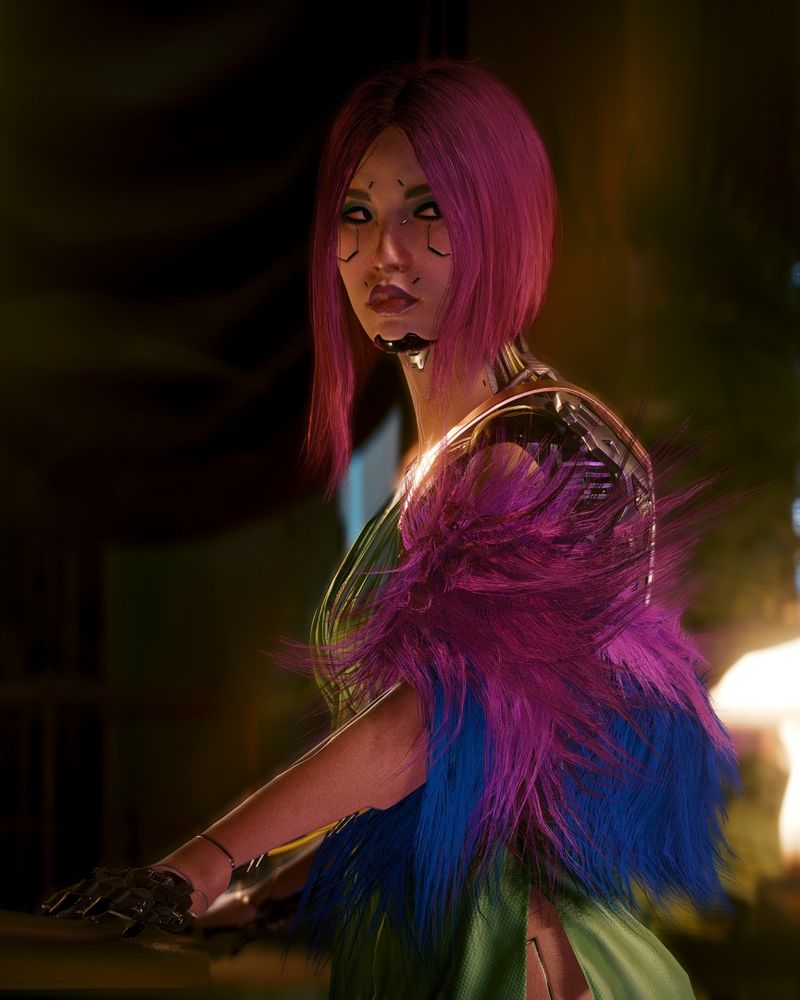 Song So Mi, a character from Cyberpunk 2077's Phantom Liberty DLC, stands over and holds a railing at a fancy party. She is a Korean woman, wearing cyberware attachments in her face. Her lips have dark purple make-up on, and her eyes have a dark shadow around them.

She's wearing a light green dress with blue and purple feathers on her shoulders. Her shoulders are cybernetic implants rather than real shoulders, as is the hand she's using to hold the railing, but her neck and arm is real skin. Part of her thigh, also cybernetic, is exposed by a cut in the dress.

Blurred by depth-of-field in the background are very bright, luxury lights and structures, and a plant.