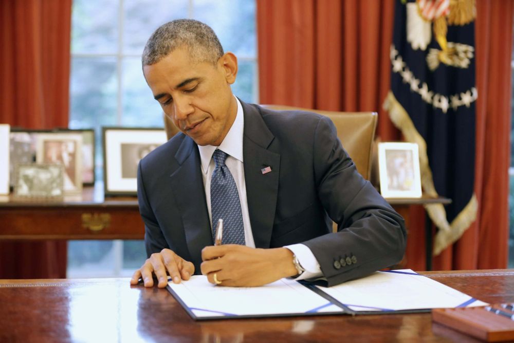 President Obama writing