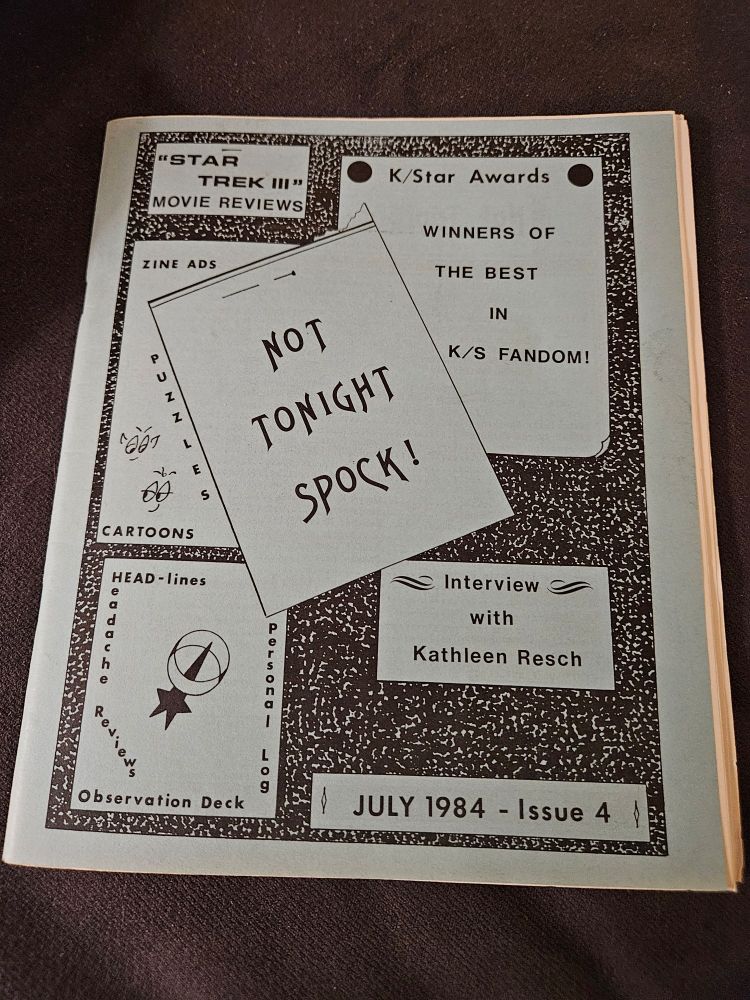 Front cover of Star Trek fanzine "Not Tonight Spock #4" on blue paper with text in squares.